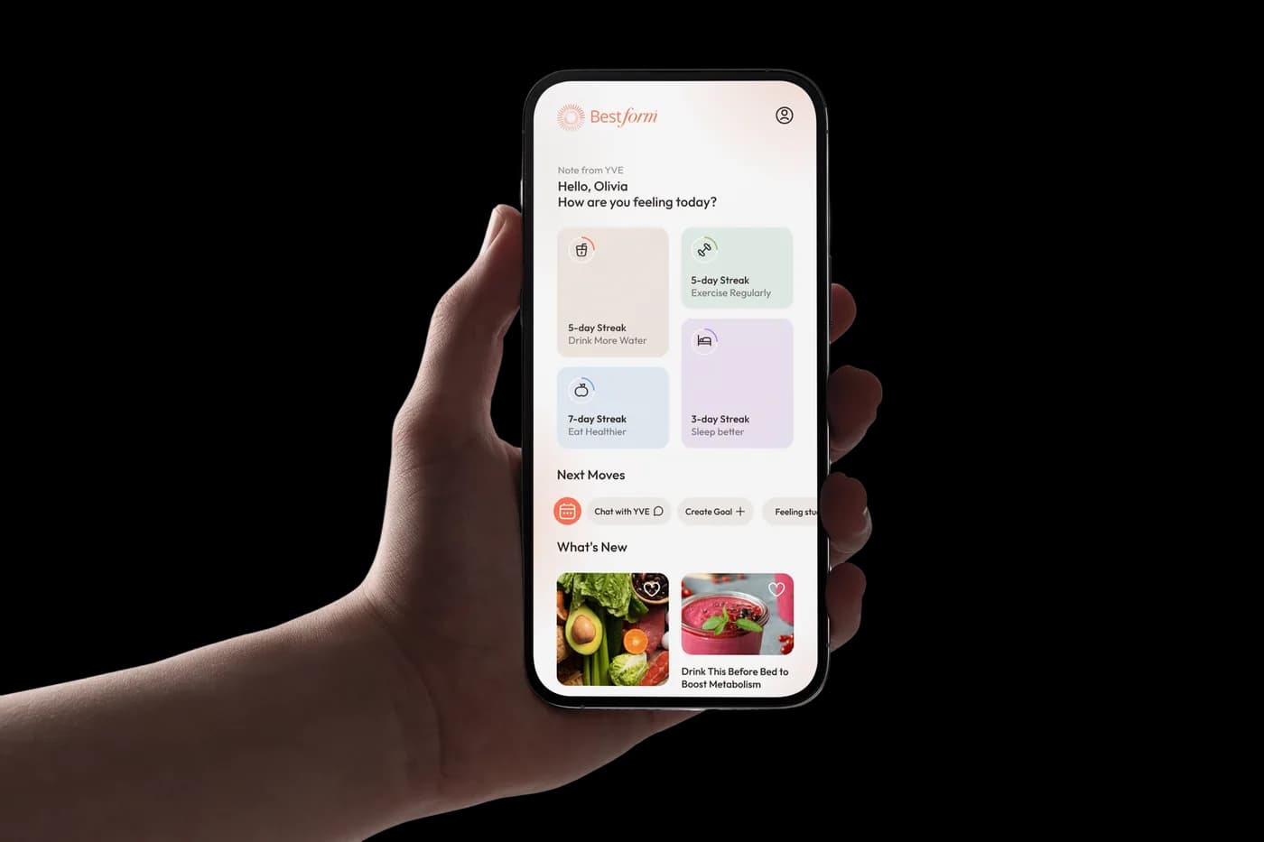 Hand holding iPhone with the mobile app home screen